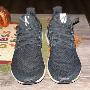 Adidas Ultra Boost athletic shoes.